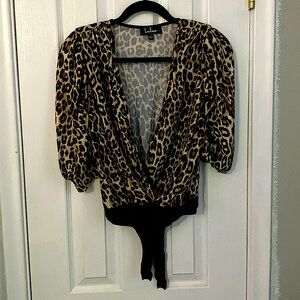 Size small leopard leotard mid lenght sleeve.